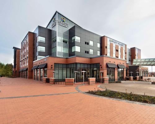 a building on a brick street with a brick at Hyatt Place Moncton-Downtown in Moncton
