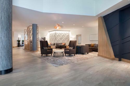 a lobby with couches and a waiting room at Hyatt Place Moncton-Downtown in Moncton