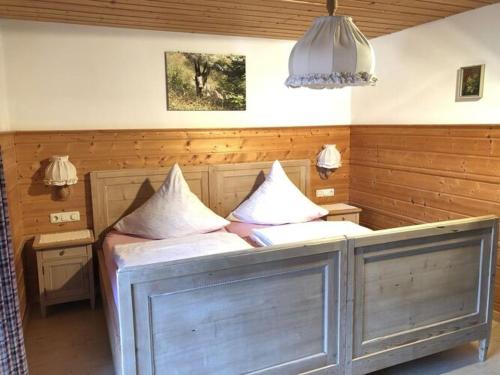a bedroom with two beds with pillows on them at Holiday apartment Haus Eberle No 2 in Bad Hindelang
