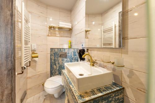 Koupelna v ubytování Padre Boutique Hotel