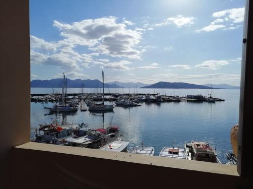 a view of a marina with boats in the water at Aegina Port Apt 2-Διαμέρισμα στο λιμάνι της Αίγινας 2 in Aegina Town