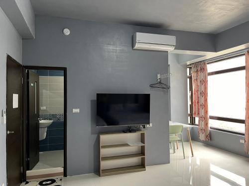 Μια τηλεόραση ή/και κέντρο ψυχαγωγίας στο Sea Snail 2 B&B