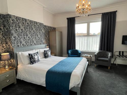 Ένα ή περισσότερα κρεβάτια σε δωμάτιο στο Birkdale Guest House