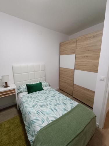 Postel nebo postele na pokoji v ubytování APARTAMENTO ESTEL