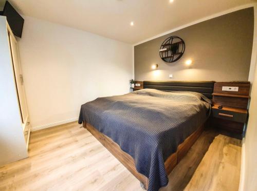 Ένα ή περισσότερα κρεβάτια σε δωμάτιο στο Haus Seeschwalbe Borkum
