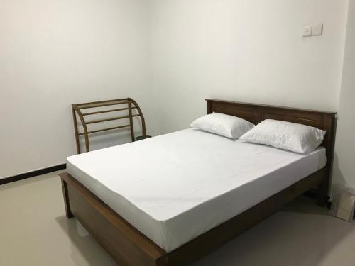 מיטה או מיטות בחדר ב-Golden holiday home