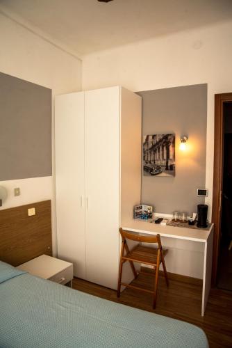 Postel nebo postele na pokoji v ubytování Albergo La Marinella