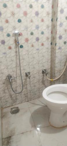 Koupelna v ubytování Hotel Parvati Stey Home Ujjain