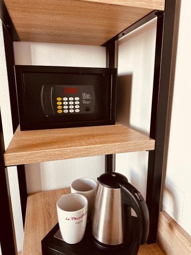 Kaffee-/Teezubehör in der Unterkunft Logis Le Passiflore Cognac