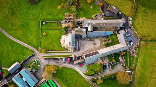 an aerial view of a building in a field at Ty Newydd B&B in Brecon
