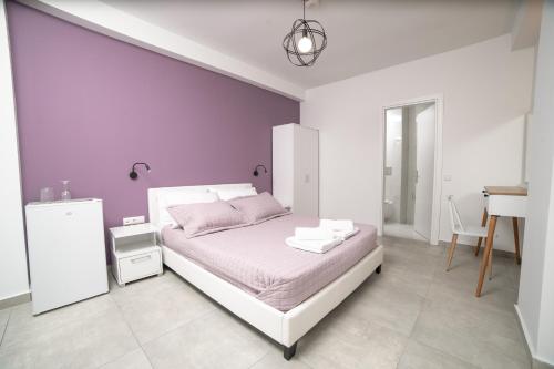 Ένα ή περισσότερα κρεβάτια σε δωμάτιο στο Bluegreen eco studios