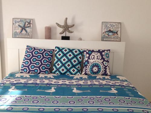 מיטה או מיטות בחדר ב-Casa Vacanze Palma