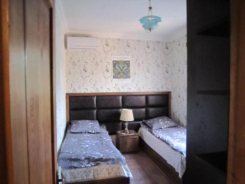 Ένα ή περισσότερα κρεβάτια σε δωμάτιο στο Villa in Tbilisi