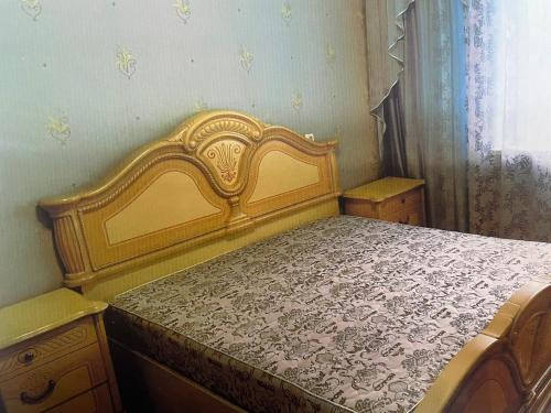 מיטה או מיטות בחדר ב-Шымкент, Север, квартира 2 комнаты
