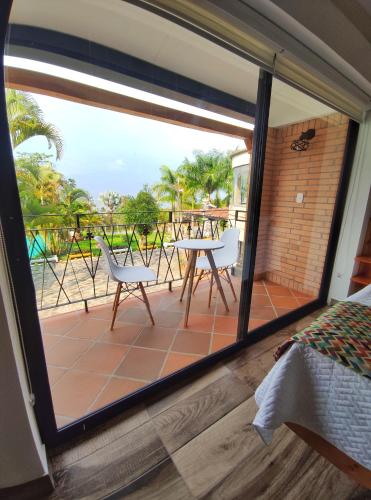 Ein Balkon oder eine Terrasse in der Unterkunft La Cabaña Miraflores