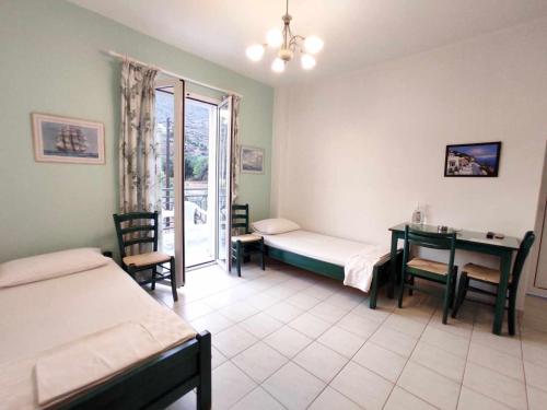 Postel nebo postele na pokoji v ubytování Villa Zefiros