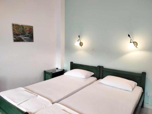 Postel nebo postele na pokoji v ubytování Villa Zefiros
