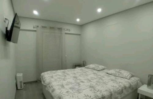 Postelja oz. postelje v sobi nastanitve Casa da Praia