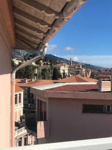 a view from the balcony of a building at Lumineux studio sous les toits de Menton in Menton