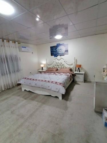 Postel nebo postele na pokoji v ubytování Heritige Inn Jordan
