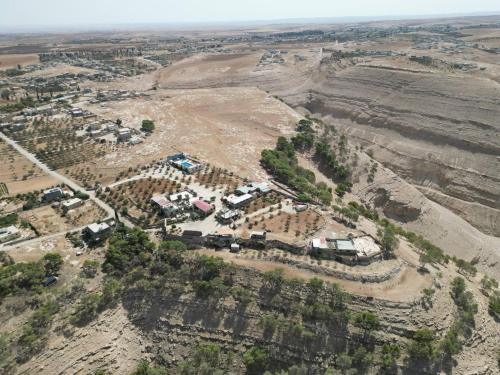 an aerial view of a camp site in the desert at Heritige Inn Jordan in Ad Dimnah