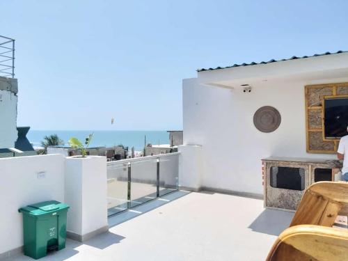 a balcony with a view of the ocean at Hotel Dreimar in Cartagena de Indias