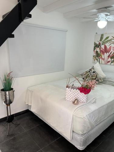 Ein Bett oder Betten in einem Zimmer der Unterkunft Exclusive Apartment with loft in Altos del Maria