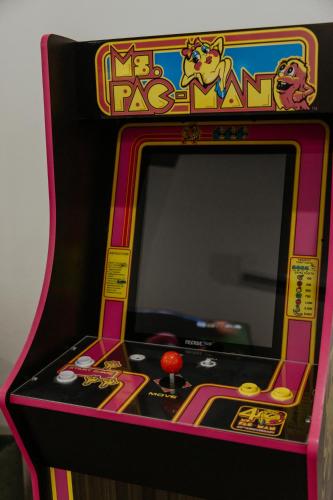 a hello kitty arcade game in a room at Vida Palace in Jacó