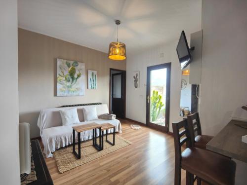A bed or beds in a room at Las Casitas Masdache
