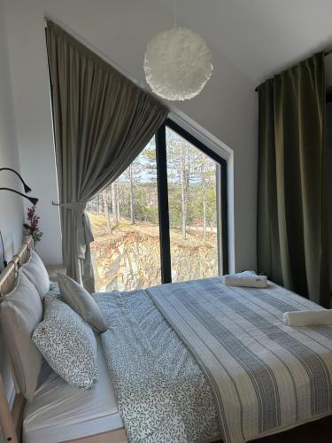 Postel nebo postele na pokoji v ubytování Apartman Zir