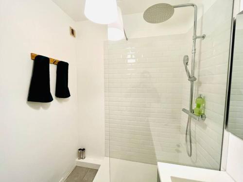 a bathroom with a shower with a glass door at Nice 1 bedroom in Chantilly in Chantilly
