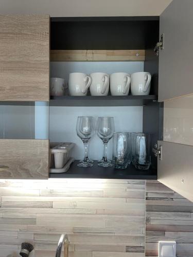 Η κουζίνα ή μικρή κουζίνα στο Cozy Narva Mäe Apartment