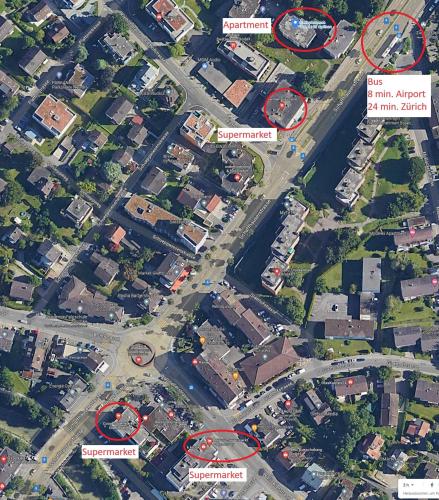 an overhead view of a city with houses and roads at Cartea Apartments Zürich Airport in Opfikon