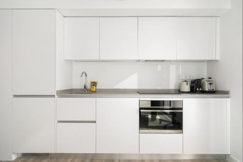 Dapur atau dapur kecil di Dobo Madrid San Diego