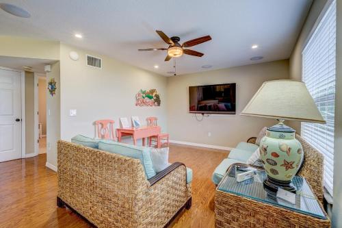 a living room with two chairs and a table at Sea Site Retreat Unit B! Great attractions nearby! Short walk to the beach! in Bradenton Beach