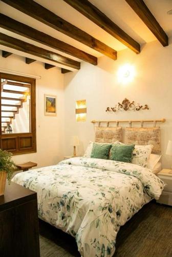 Letto o letti in una camera di Santa Lucía Casa Hotel