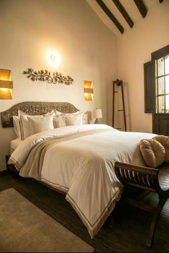 Letto o letti in una camera di Santa Lucía Casa Hotel