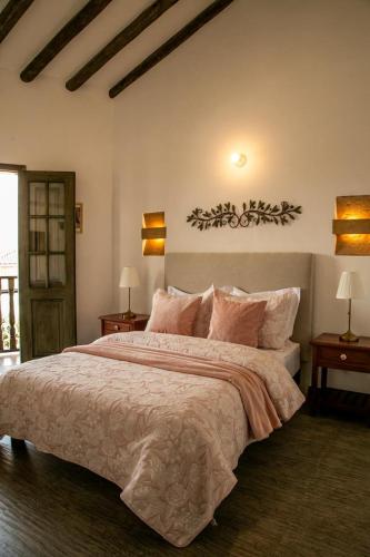 Letto o letti in una camera di Santa Lucía Casa Hotel