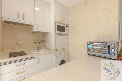 Benal Beach apartment with sunny terrace and water park