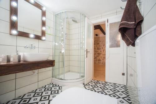 a bathroom with a toilet and a sink and a shower at Apartments with parking space Janjina, Peljesac - 21984 in Janjina