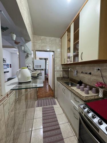 a kitchen with a sink and a counter top at Apartamento Copa Dreams HIR 11 in Rio de Janeiro