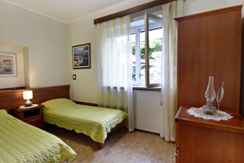 Apartments with parking space Umag - 22722