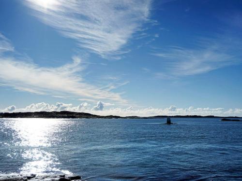 a large body of water with a boat in it at 4 star holiday home in Öckerö-By Traum in Öckerö