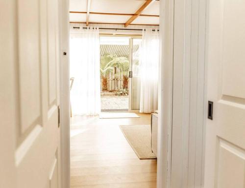 an open door to a room with a hallway at Bay Breeze - Boat - Bike - Hike in St Helens