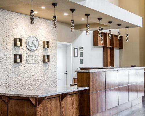 a lobby of a cancer clinic with a reception counter at Comfort Suites Woodland - Sacramento Airport in Woodland