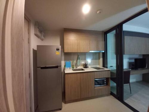 Kuchyň nebo kuchyňský kout v ubytování Happy Life at LacasitaD-HuaHin