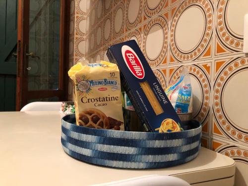 a bowl of food on a table with snacks at Villa Margherita in Alghero