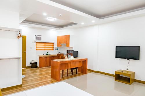 Afbeelding uit fotogalerij van E and c tourist inn in Dumaguete