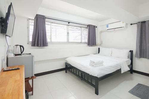 Posteľ alebo postele v izbe v ubytovaní GO INN Rama3 โกอินน์ พระราม3