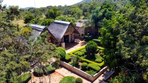 an aerial view of a house with a garden at Thaba Legae Guest Lodge in Rustenburg